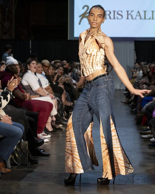 Model in tie-dye flares on the 2024 runway