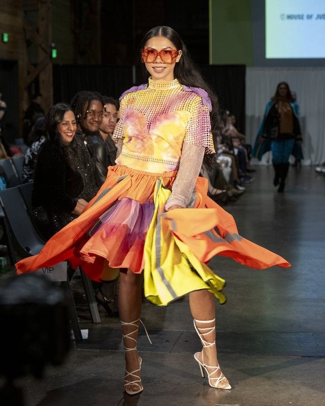 Model in a bright layered skirt at the 2024 show