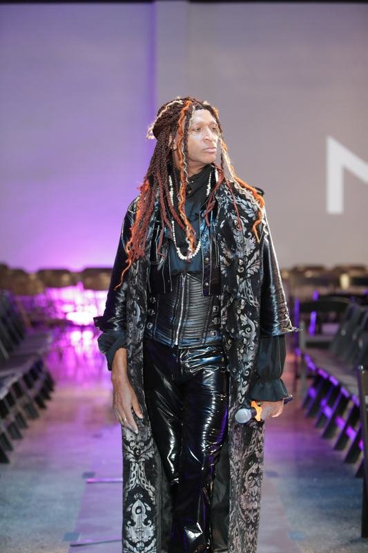 Model walking for a designer at Le Pasefika Runway 2025