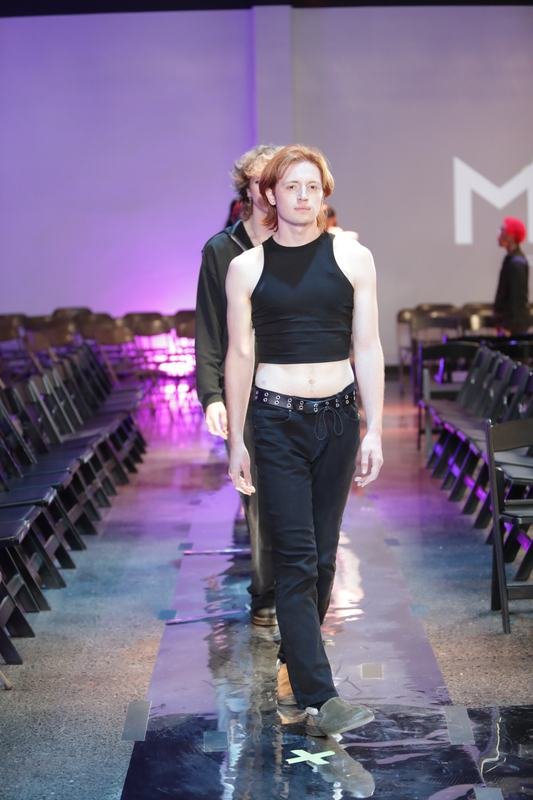 Model in a designer collection at the 2025 Le Pasefika Runway show