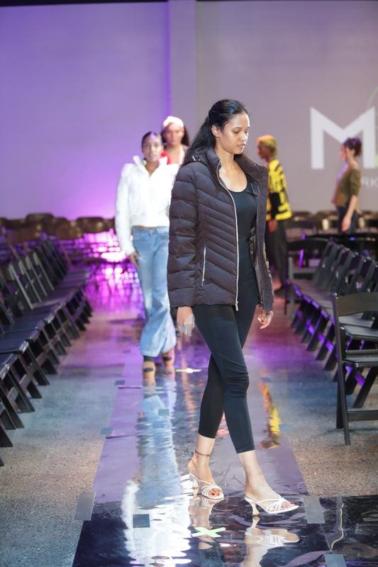 Model walking the runway at Le Pasefika Runway 2025