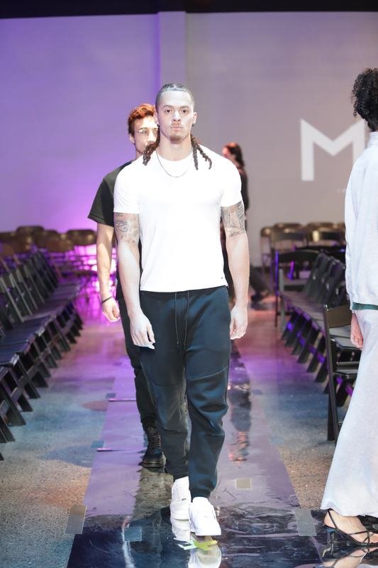 Model showcasing a designer garment at Le Pasefika Runway 2025
