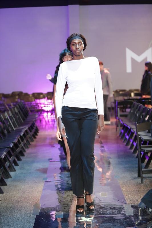 Model walking the runway at Le Pasefika Runway 2025