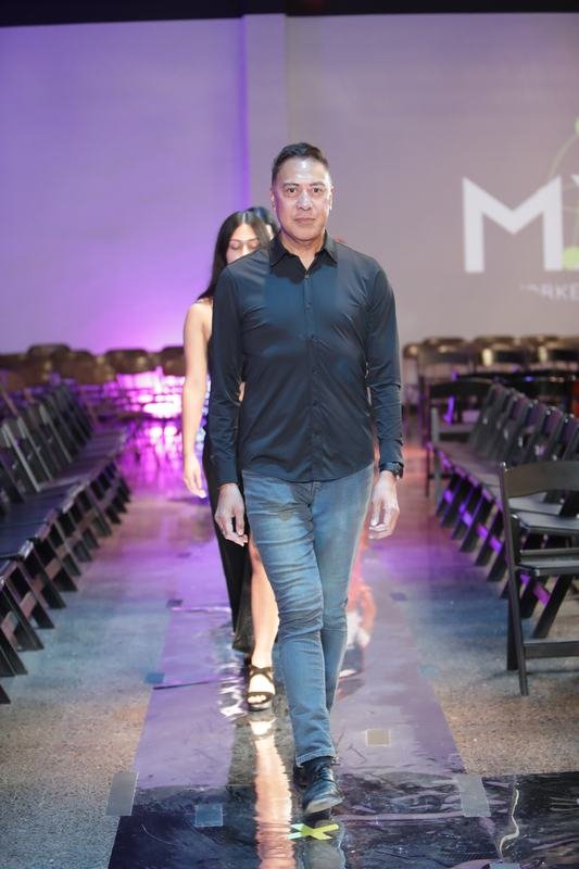 Model in a designer collection at the 2025 Le Pasefika Runway show